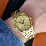 Tissot T137.207.33.021.00 PRX Powermatic 80 Men's Watch – Gold Dial & Gold Steel Strap