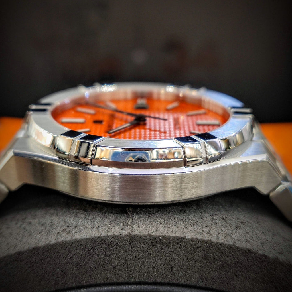 Maurice Lacroix AI6008 Aikon Automatic Date Men’s Watch – Orange Dial & Silver Steel Strap