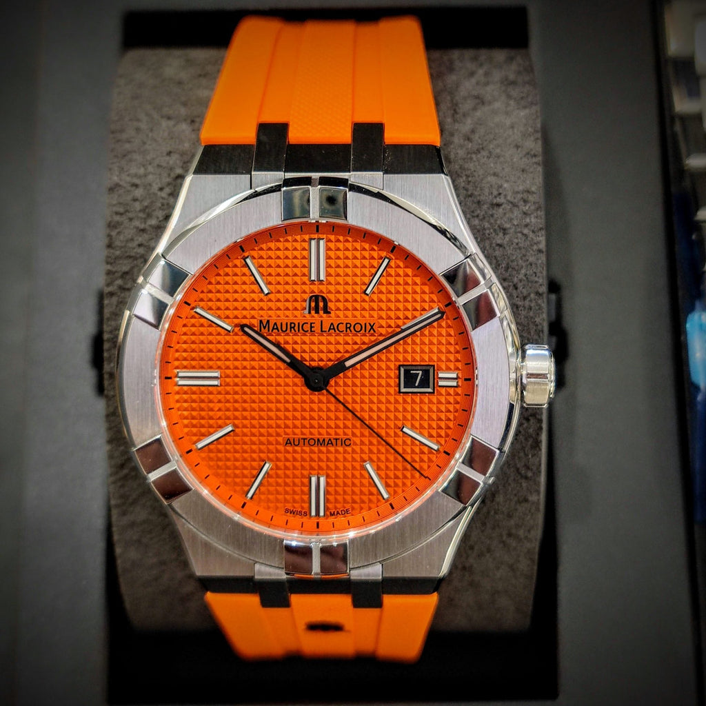 Maurice Lacroix AI6008 Aikon Automatic Date Men’s Watch – Orange Dial & Silver Steel Strap