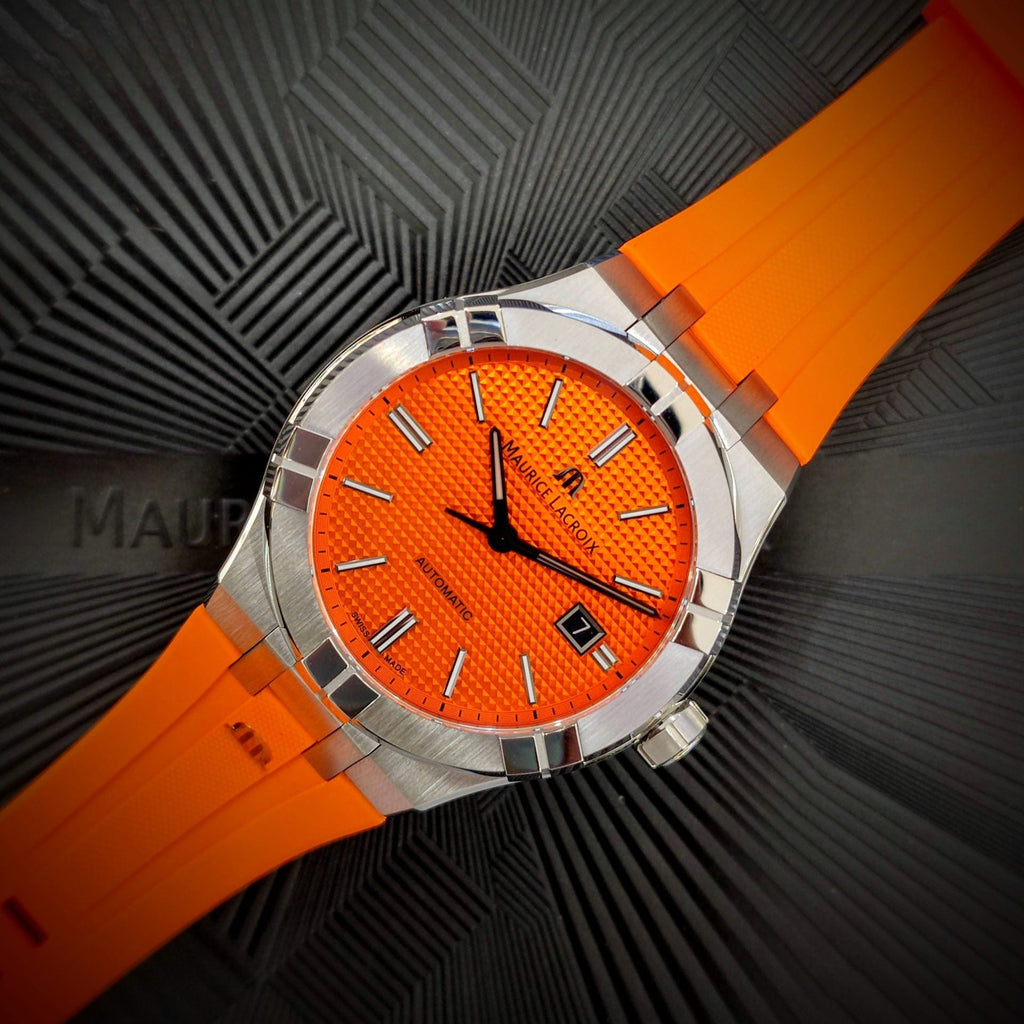 Maurice Lacroix AI6008 Aikon Automatic Date Men’s Watch – Orange Dial & Silver Steel Strap