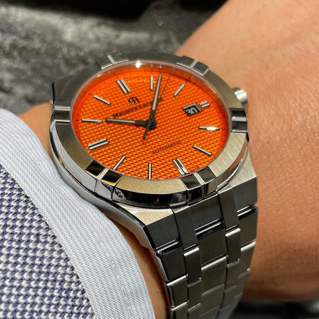 Maurice Lacroix AI6008 Aikon Automatic Date Men’s Watch – Orange Dial & Silver Steel Strap