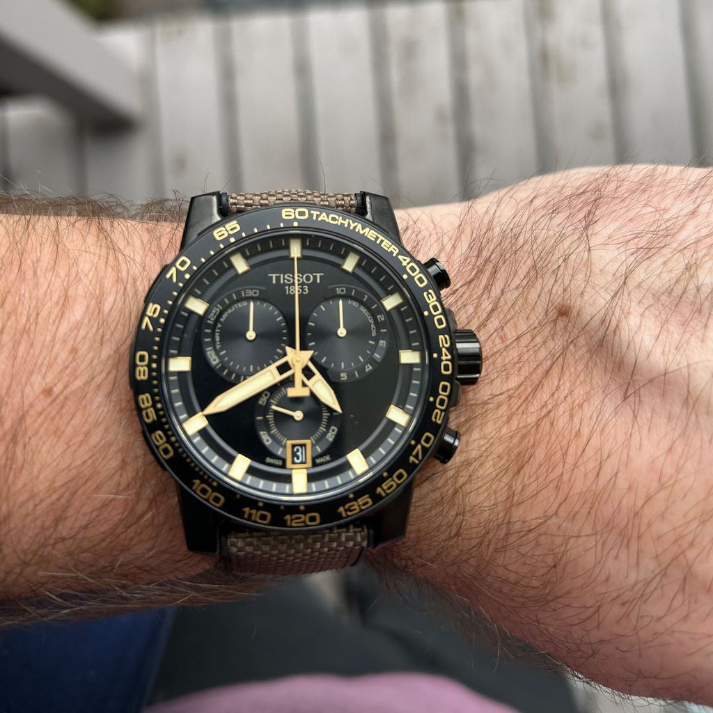 Tissot T125.617.37.051.01 Supersport Chrono Men’s Watch – Black Dial & Beige Nylon Strap