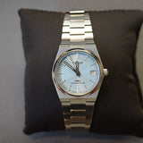 Tissot T137.207.11.351.00 PRX Powermatic 80 Men's Watch – Ice Blue Dial & Silver Steel Strap