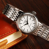 Tissot T085.207.11.011.00 T-Classic Carson Automatic Women's Watch – White Dial & Silver Steel Strap