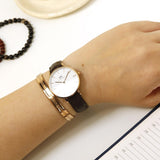 Daniel Wellington DW00100173 Petite Reading Women’s Watch – White Dial with Black Leather Strap