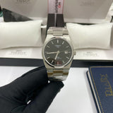 Tissot T137.207.11.051.00 PRX Powermatic 80 Men's Watch – Black Dial & Silver Steel Strap