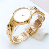 Calvin Klein K6E23546 Snake Women's Watch – Silver Dial & Yellow Gold Steel Strap