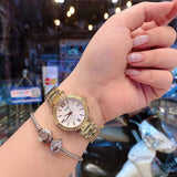 Guess Park Ave South Analog White Dial Gold Steel Strap Watch For Women - W0767L2