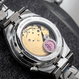 Citizen x Pantone NJ0158-89X Men's Automatic Watch – Dreamy Pink Dial with Silver Steel Strap