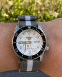 Seiko 5 Sports x Peanuts Surfboard Snoopy Limited Edition White Dial Two Tone NATO Strap Watch For Men - SRPK25K1