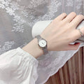 Calvin Klein Minimal White Dial Silver Mesh Bracelet Watch for Women - K3M23126