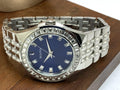 Bulova Phantom Baguette Crystal Blue Dial Silver Steel Strap Watch for Men - 96A254
